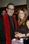 Eric Kugler and Lisa Skora  at the People Reaching Out Holiday Charity Event at the private residence of David Larkin on 12-13-04 in Manhattan, N.Y. photo by Rob Rich copyright 2004<br>516-676-3939<br>robwayne1@aol.com