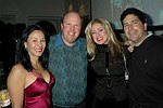 Christana DeSimone, Ken Padover, Trish Backal, and Phil Carlucci  at the People Reaching Out Holiday Charity Event at the private residence of David Larkin on 12-13-04 in Manhattan, N.Y. photo by Rob Rich copyright 2004<br>516-676-3939<br>robwayne1@aol.com