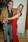 David Larkin and Jennifer M. Saraf   at the People Reaching Out Holiday Charity Event at the private residence of David Larkin on 12-13-04 in Manhattan, N.Y. photo by Rob Rich copyright 2004<br>516-676-3939<br>robwayne1@aol.com