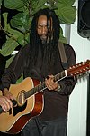 Performing  at the People Reaching Out Holiday Charity Event at the private residence of David Larkin on 12-13-04 in Manhattan, N.Y. photo by Rob Rich copyright 2004<br>516-676-3939<br>robwayne1@aol.com