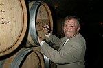 Jacques Pepin signing a 2003 cabernet franc at the Wolffer Estates<br> at the Maryhaven Center of Hope gala honoring chef Jacques Pepin at the Wolffer Estates in Sagaponack, N.Y. on 6-4-05. photo by Rob Rich copyright 2005 516-676-3939 robwayne1@aol.com